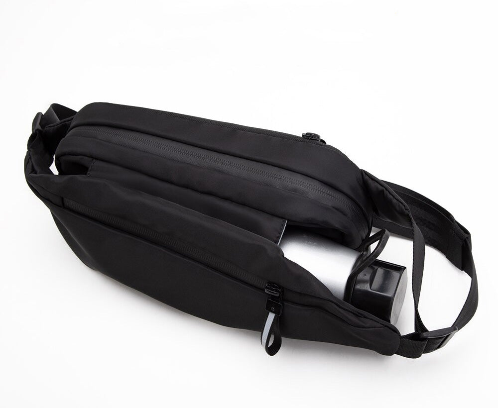Multi-pocket water-resistant fanny pack, ideal for organizing items for hands-free travel, sport, or daily use.