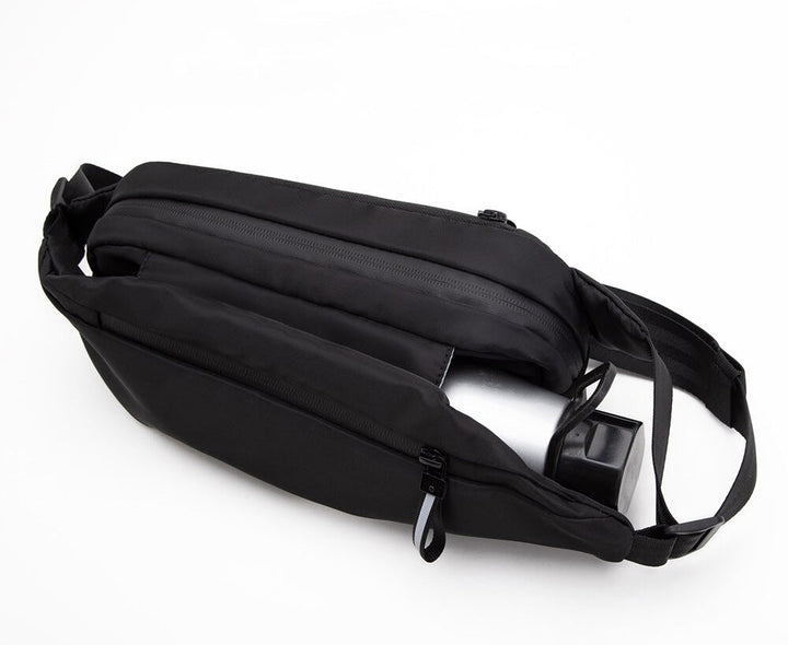 Multi-pocket water-resistant fanny pack, ideal for organizing items for hands-free travel, sport, or daily use.