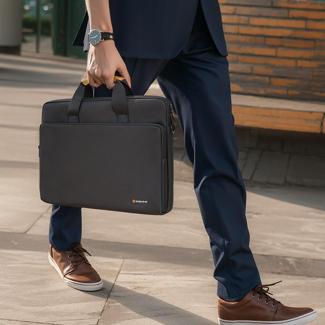 All-weather unisex laptop shoulder bag, water-resistant exterior, 360° padded interior.
