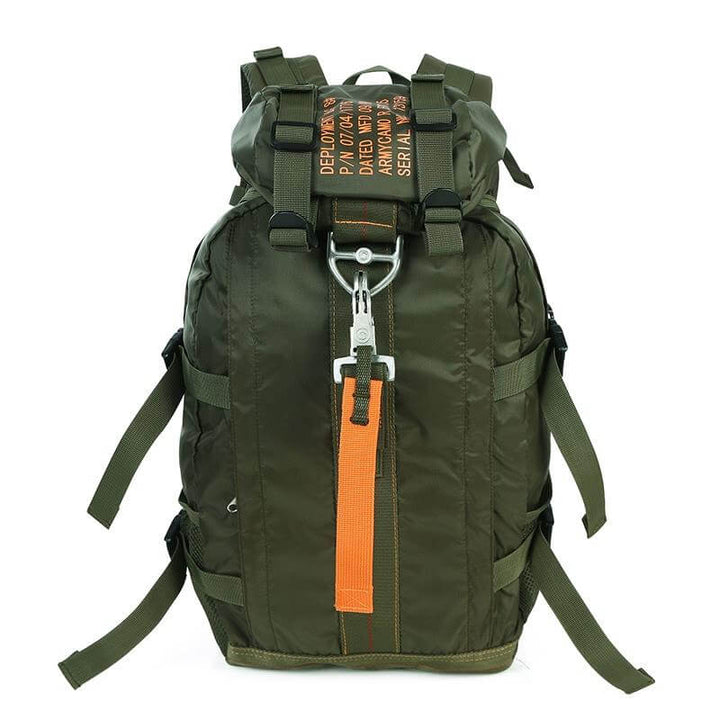 Durable FieldGear tactical backpack in an outdoor mountain setting, perfect for hiking & adventure.