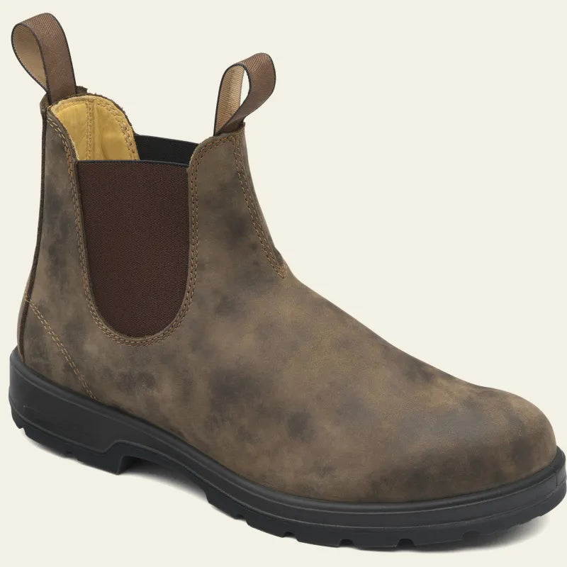Durable brown unisex waterproof Chelsea boots for all-weather protection. Slip-on design offers comfort & everyday style.
