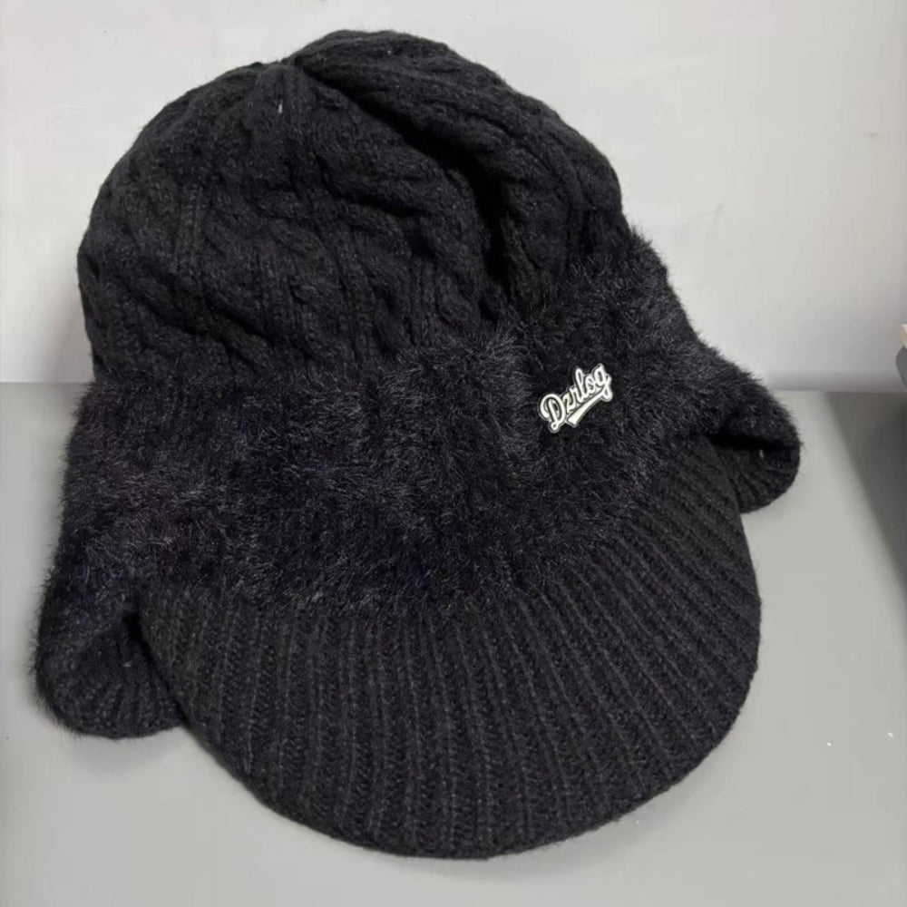 Unisex winter ear flap knit cap, classic trapper style for warmth during cold outdoor adventures.