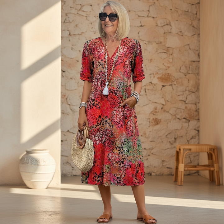 Vibrant flowing midi dress for women. Effortless style, perfect for summer & spring fashion.