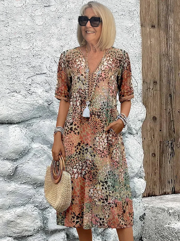 Women's effortless style: a vibrant flowing midi dress. Comfortable and elegant for daily wear.