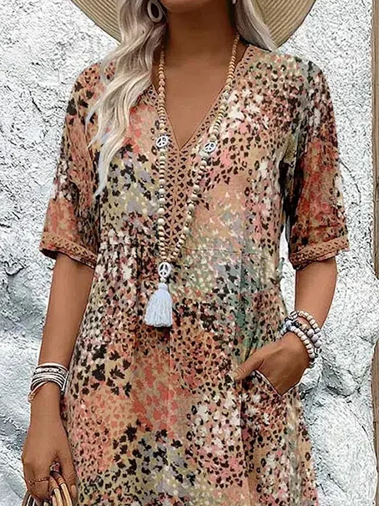 Colorful summer midi dress. This vibrant flowing women's dress offers comfortable and chic style.
