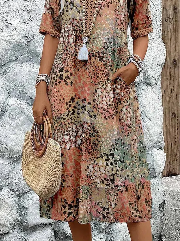 Elegant vibrant flowing midi dress for women. Perfect for spring fashion, comfortable and stylish.