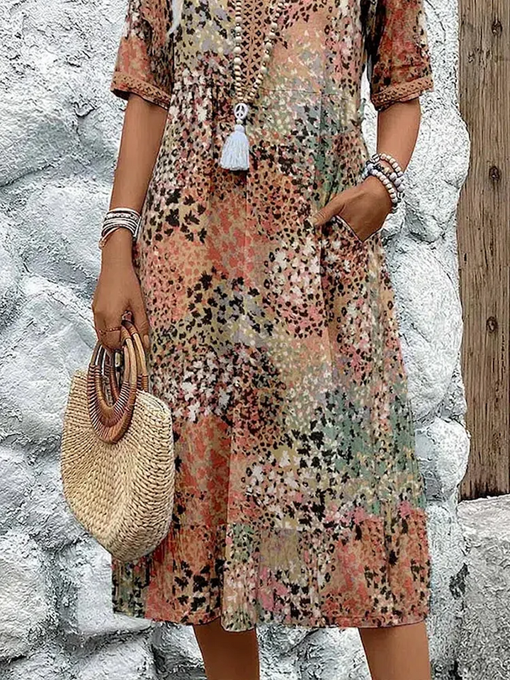 Elegant vibrant flowing midi dress for women. Perfect for spring fashion, comfortable and stylish.