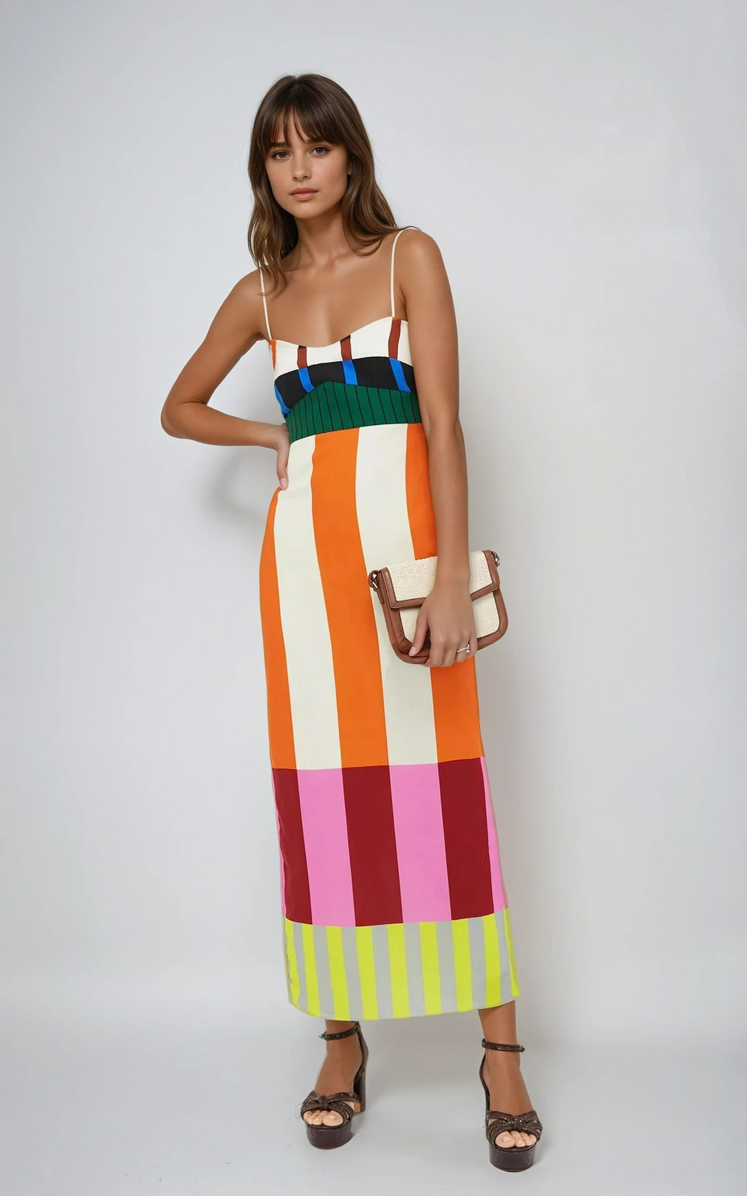 Vibrant striped women's summer maxi dress with empire waist. Perfect for casual beachwear or vacation.