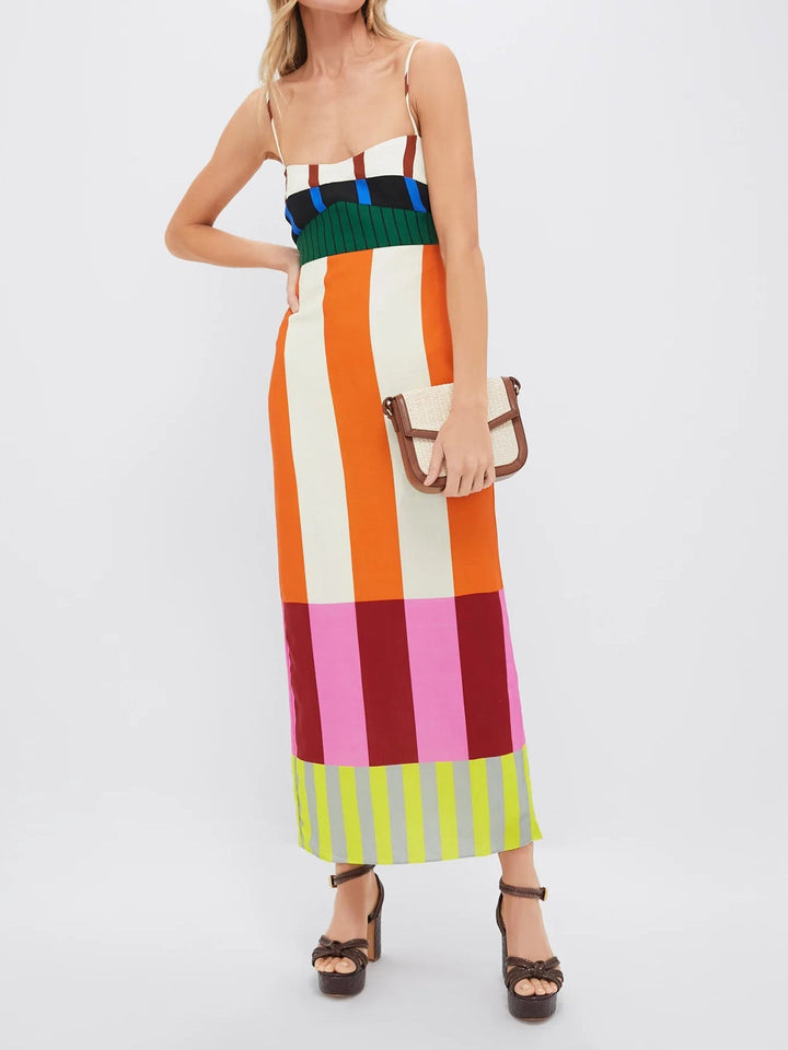 Flowy women's vibrant striped maxi dress with adjustable straps. Ideal for summer vacation & beach.