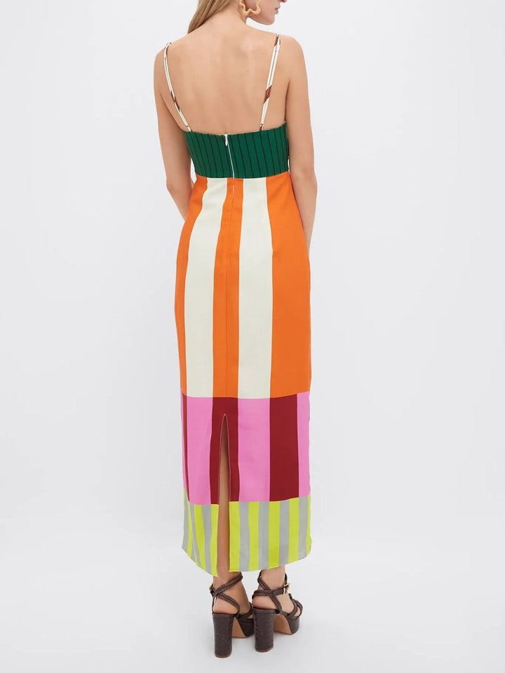 Stunning vibrant striped maxi dress for women, with adjustable straps, ideal for summer and beach days.