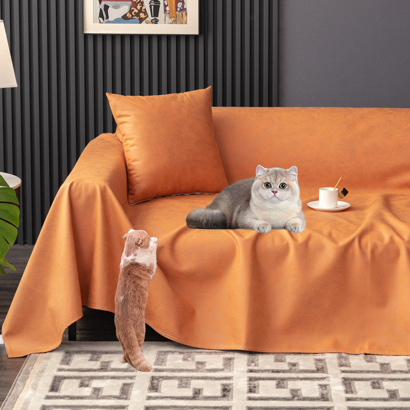 "Waterproof anti-scratch sofa cover in beige, ideal for pet owners, showcasing durable fabric and anti-slip backing."