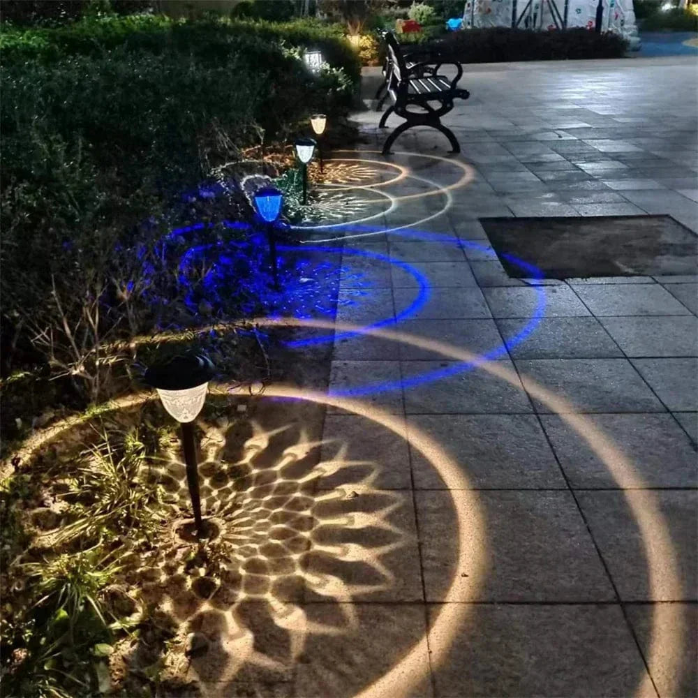 Weatherproof garden light casting intricate mandala shadows, solar-powered, LED, IP65 waterproof, enhances outdoor decor.