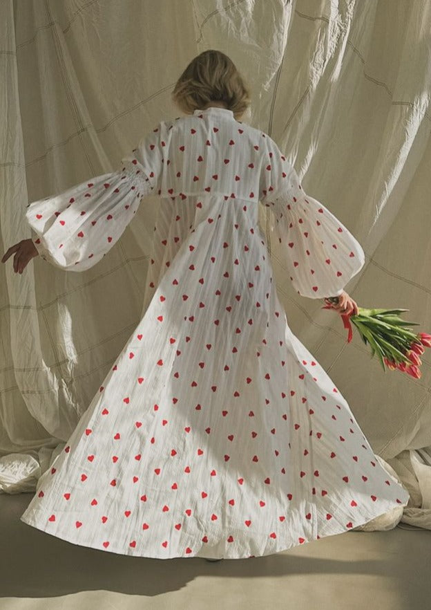 Women's white summer maxi dress, an oversized shirt style with charming heart embroidery & balloon sleeves.