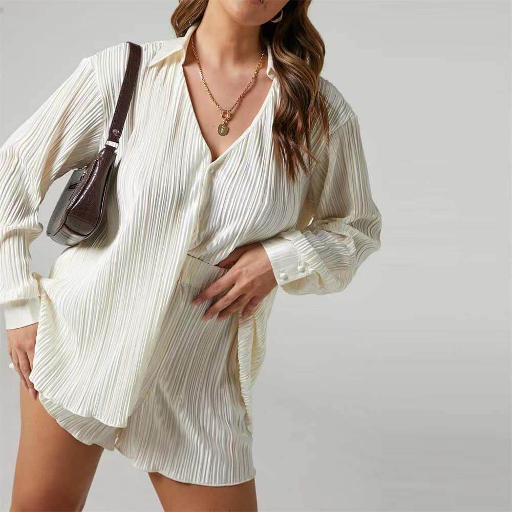 White pleated loose shirt & shorts set for women. Comfortable two-piece summer casual wear.