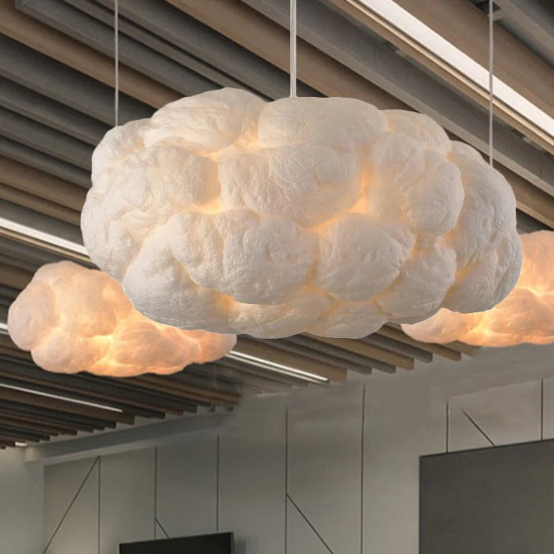 Modern white cloud LED pendant light, PVC/cotton shade, ideal ceiling fixture for contemporary living rooms.