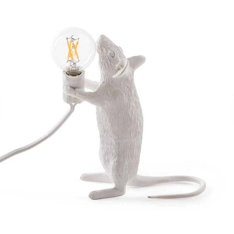 White resin SqueakLight mouse table lamp, perfect for whimsical desk or bedside decor.