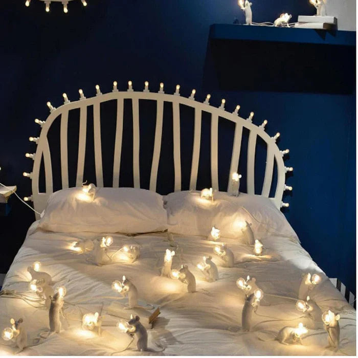 Charming gold resin mouse lamp, a whimsical SqueakLight table lamp ideal for playful home accents.