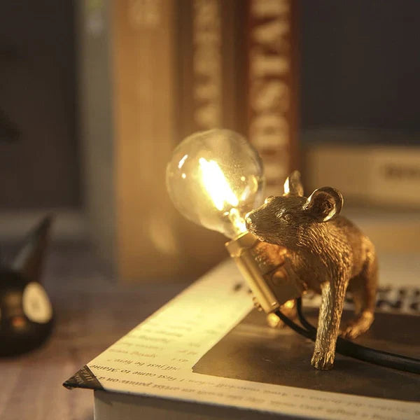 Unique SqueakLight mouse lamp, a whimsical resin table lamp perfect as a gold animal decor gift.