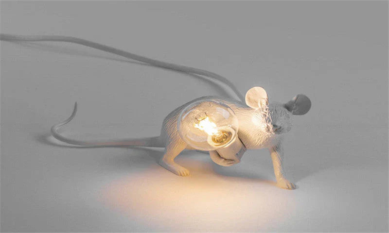 Whimsical gold mouse table lamp, an adorable resin desk lamp for kids' rooms or playful home decor.