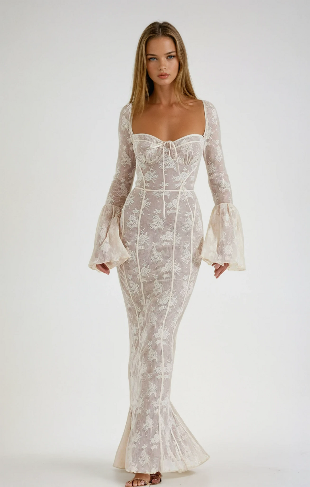 White romantic maxi dress for women, featuring a sculpted bodice and elegant fluted sleeves, ideal for special occasions.