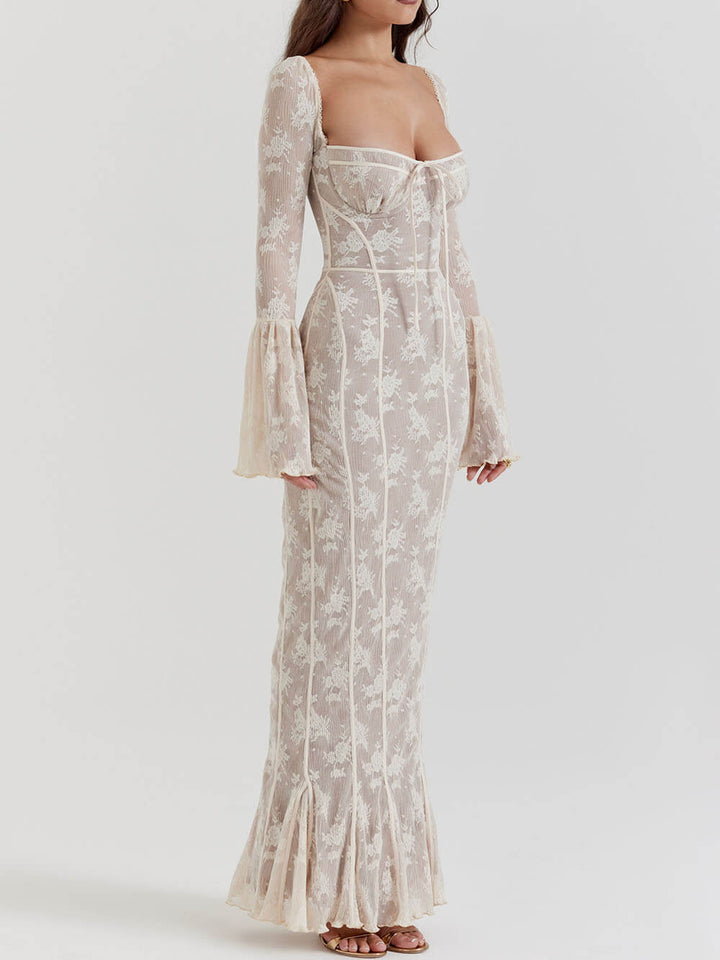 Flattering white women's maxi dress with a sculpted bodice, long fluted sleeves, and a romantic silhouette.