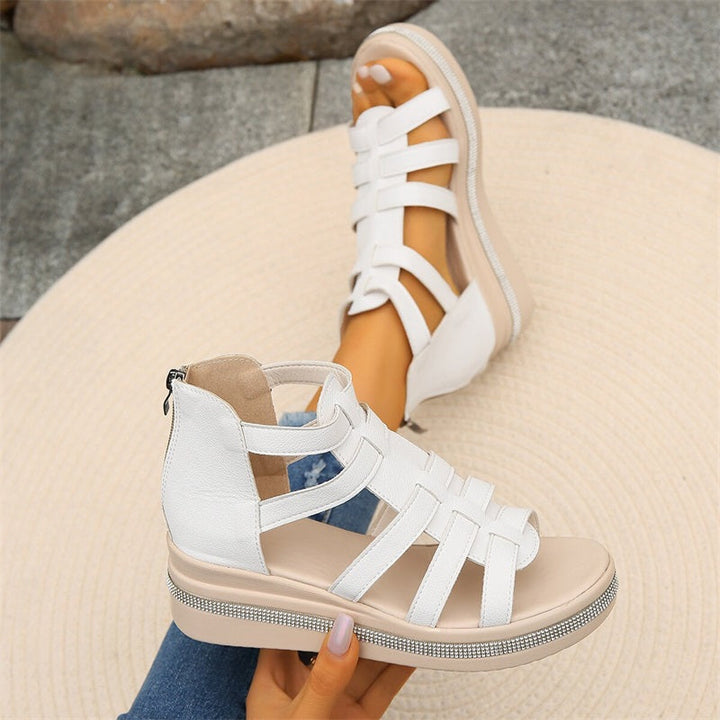 White strappy platform sandals with ankle support, perfect for summer fashion footwear