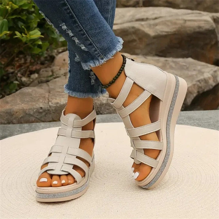 Women's white strappy platform sandals with a wide ankle support, summer essential