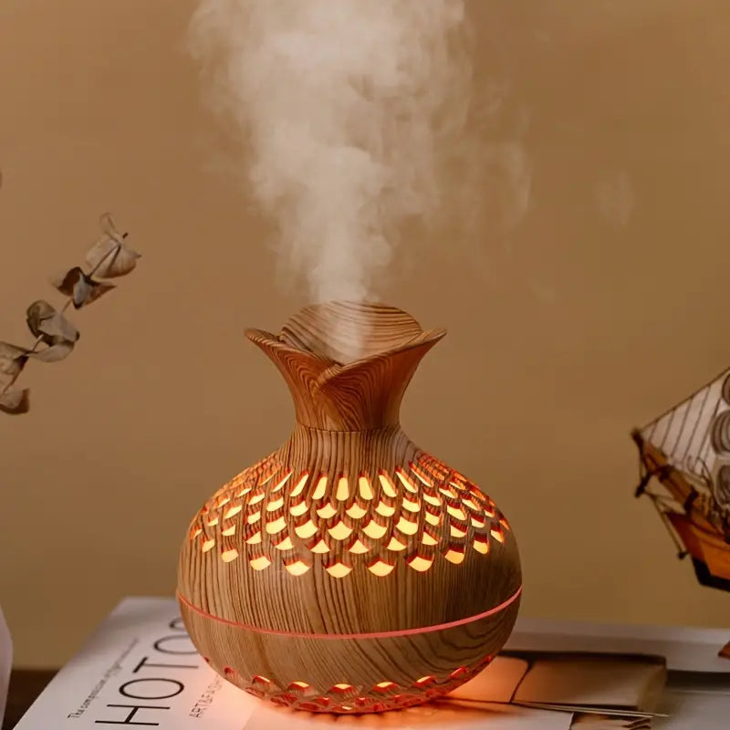 White ultrasonic essential oil diffuser for home aromatherapy & relaxation, a modern home decor piece.