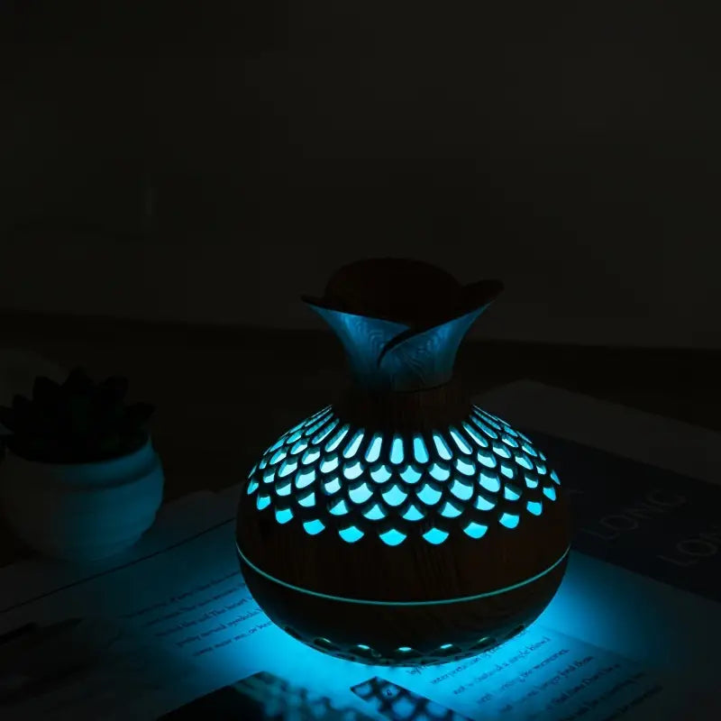 Sleek home essential oil diffuser, ultrasonic, for aromatherapy, relaxation & modern living room decor accent.