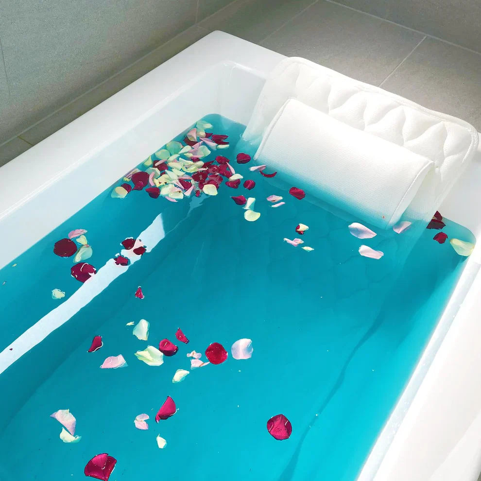 Luxurious white full body bathtub pillow for a home spa experience. Unisex mesh cushion with suction cups provides ultimate comfort.
