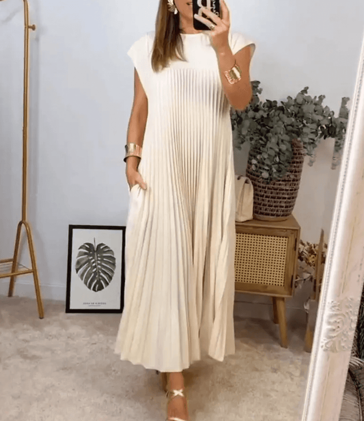 White women's long sleeve summer dress, elegant & breathable. Perfect for versatile day-to-evening wear.