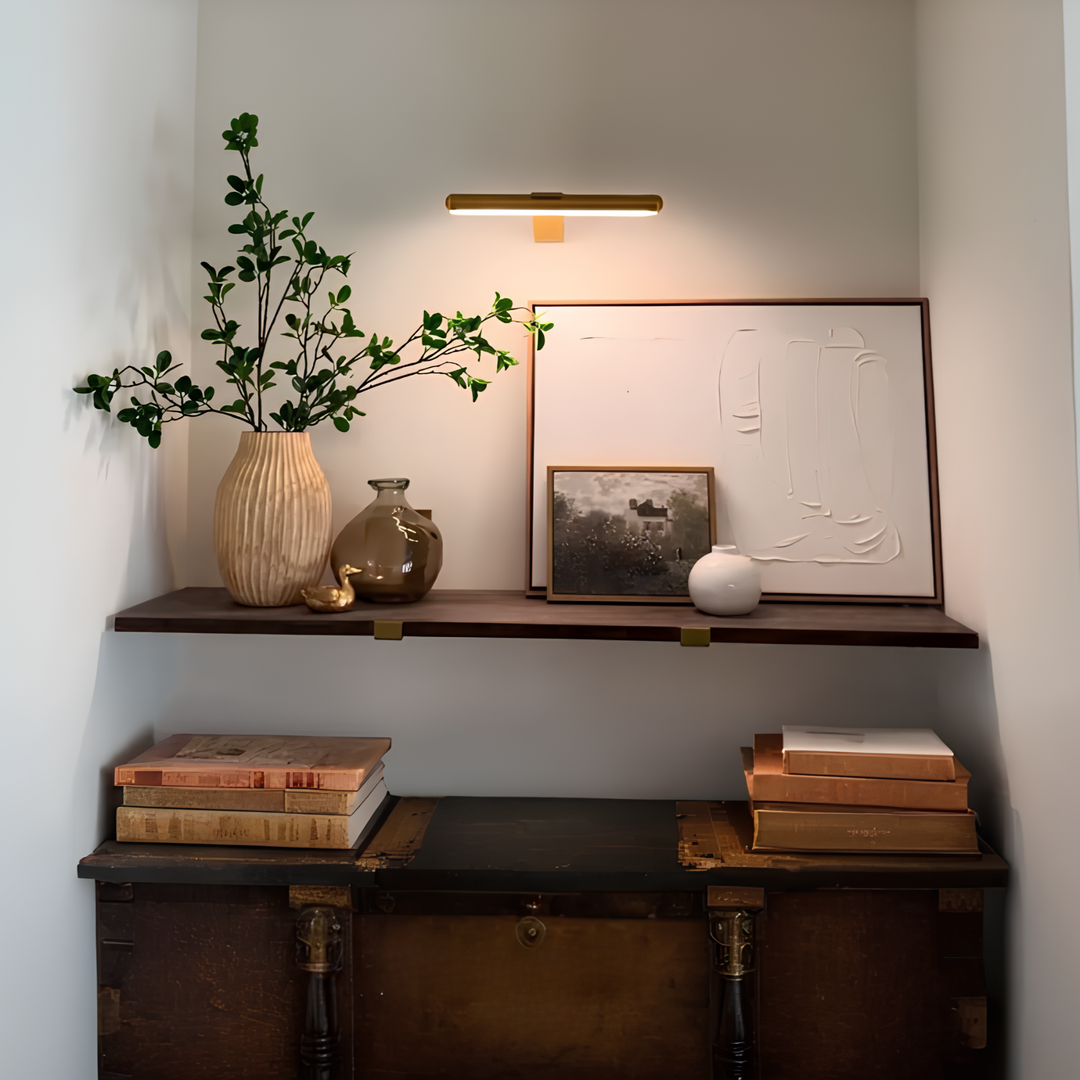 Remote control LED accent light, wireless, rechargeable, perfect for showcasing art.