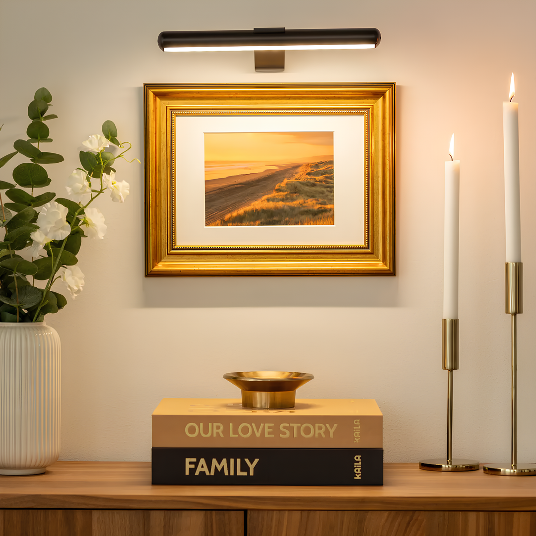 Sleek wireless LED showcase light, rechargeable, portable, for elegant art display.