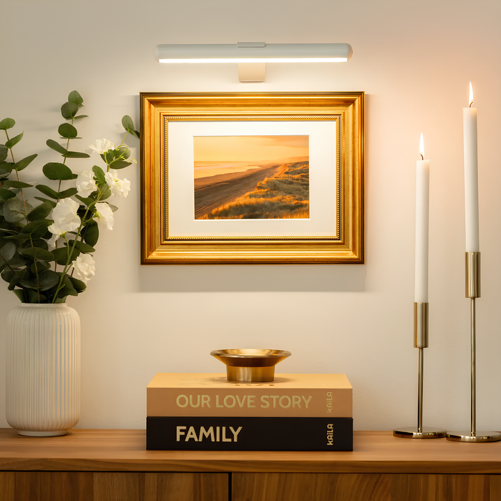 Wireless LED accent light, rechargeable, portable, for illuminating art collections.
