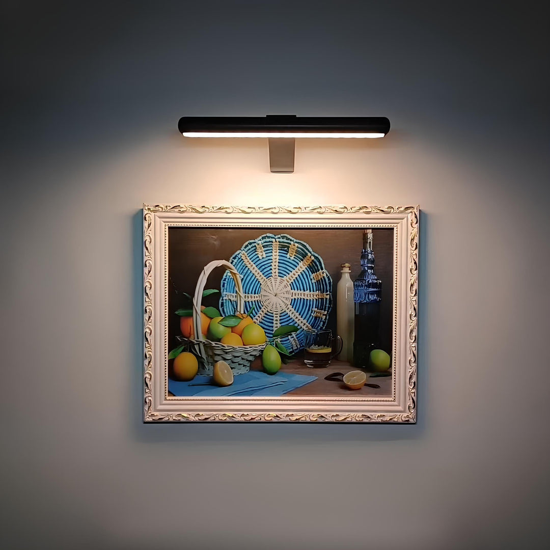 Cordless LED art light, rechargeable, portable, for accentuating home displays.