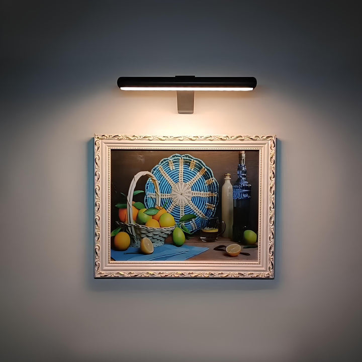 Cordless LED art light, rechargeable, portable, for accentuating home displays.