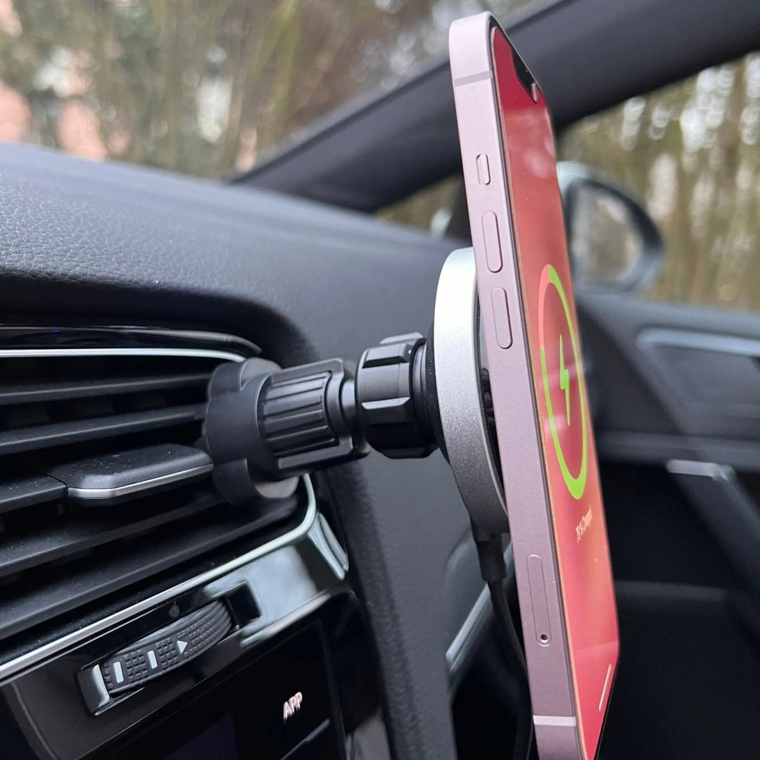 "Wireless MagSafe car charger and phone mount for iPhone, sleek design, strong magnetic hold, seamless interior fit."
