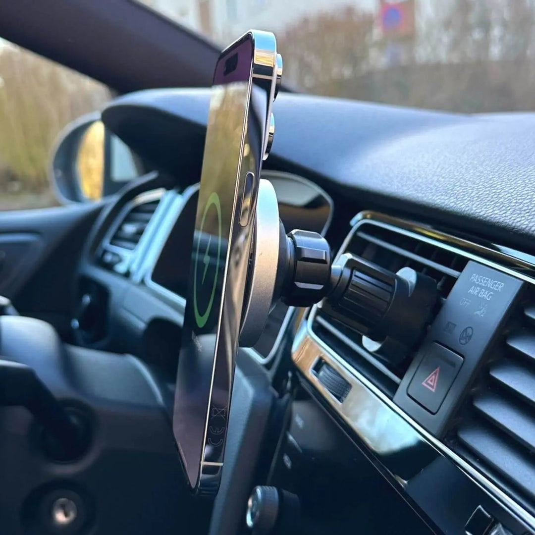 "Wireless MagSafe car charger and phone mount for iPhone, sleek design, strong magnetic hold, seamless interior fit."