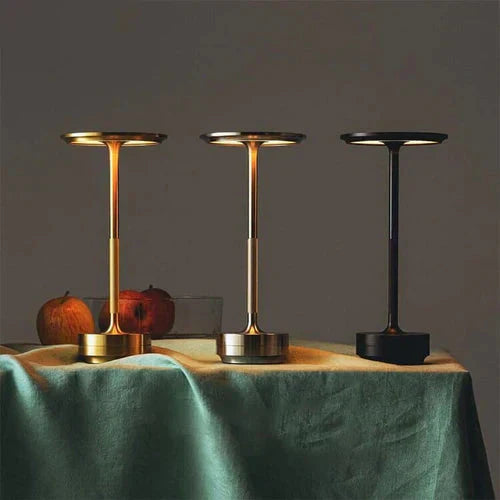 Versatile black wireless lamp, rechargeable, enhancing any space with its elegant modern design.