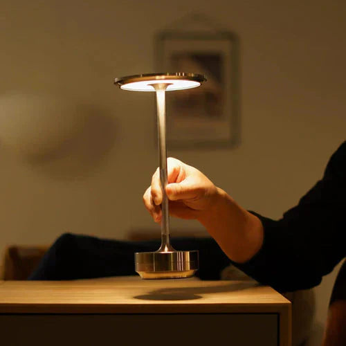 Elegant gold wireless table lamp, USB rechargeable, perfect for creating an ambient mood in any room.