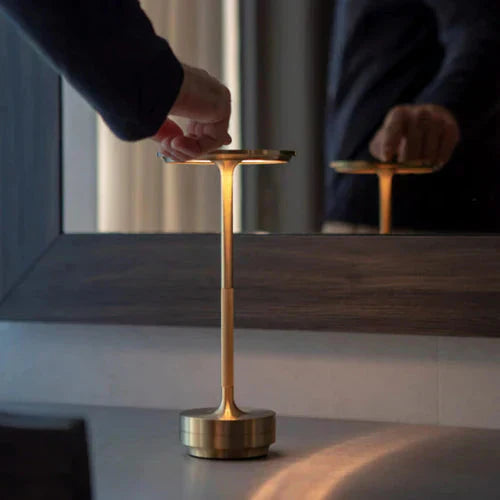 Sleek black modern table lamp, dimmable touch control, wireless & rechargeable for versatile use.