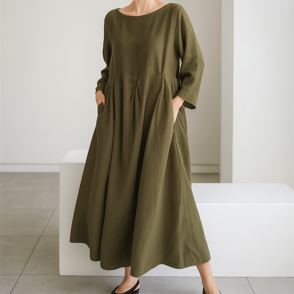 Woman wearing a relaxed fit, short sleeve crew neck everyday dress. Comfortable, versatile casual wear for summer & spring.