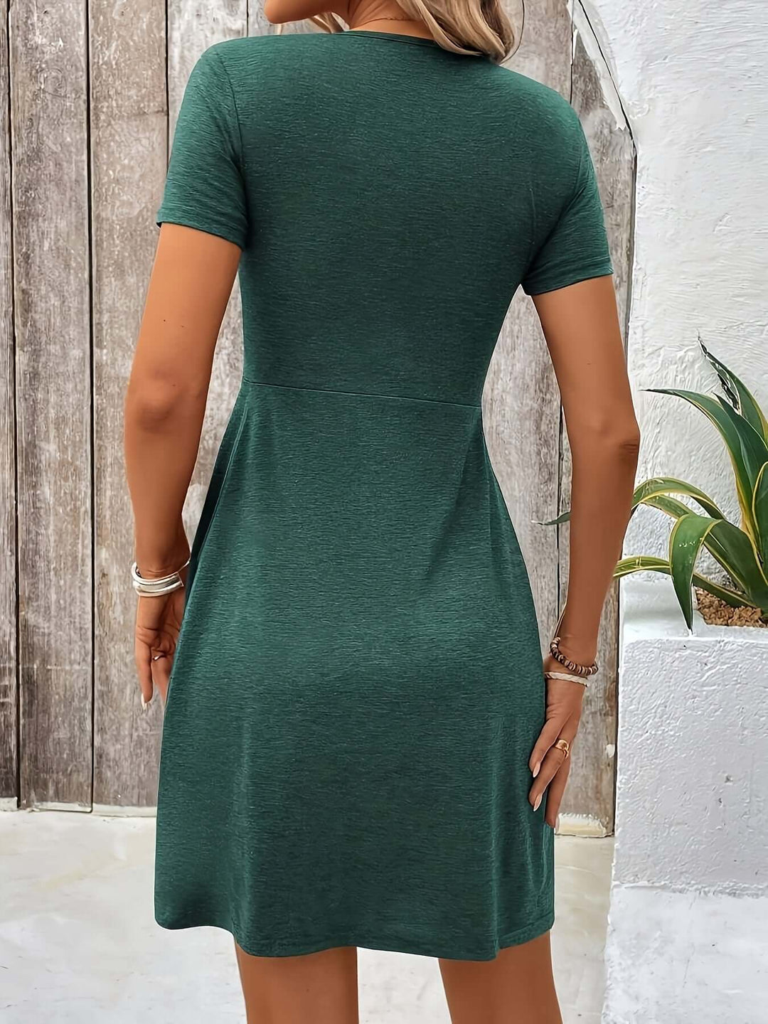 Modern sleeveless A-line dress for women, featuring a trendy twisted design for elegant comfort.
