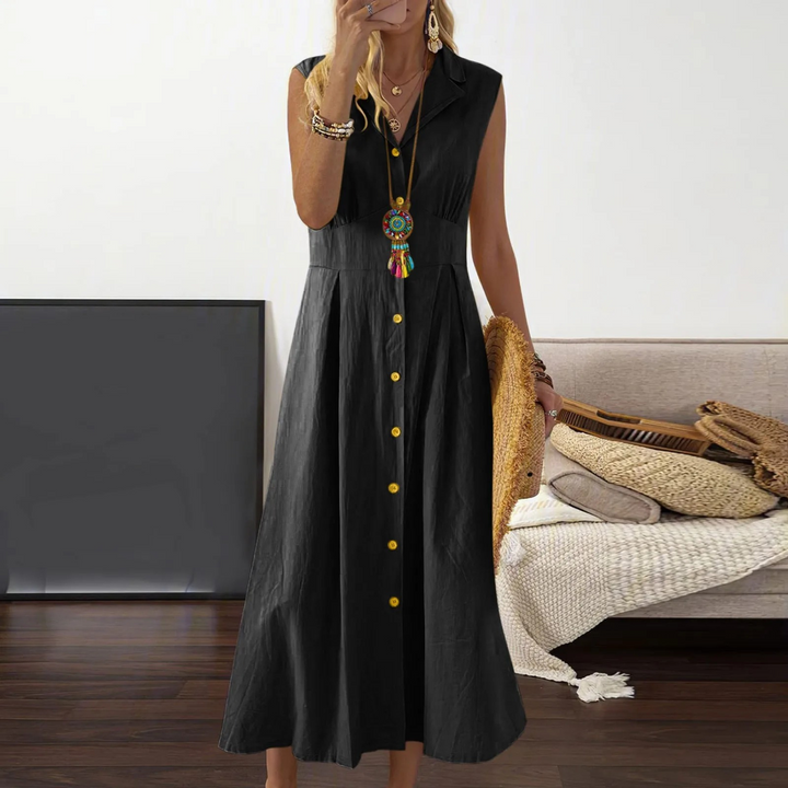 Effortless sleeveless A-line midi dress for women, with a V-neck collar. Comfortable cotton blend summer dress.