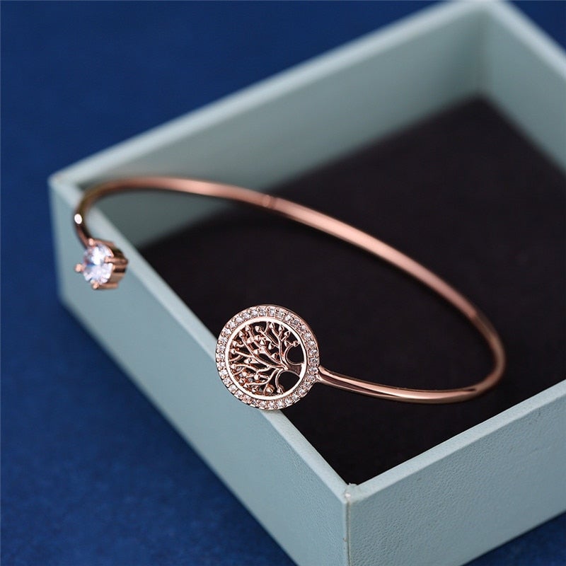 Elegant silver Tree of Life bracelet for women, adjustable. Symbolic of connection, growth, & spiritual well-being.