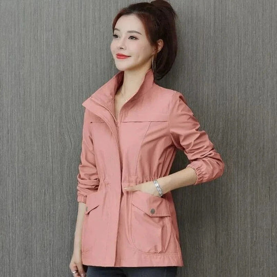Elegant women's spring trench coat with adjustable waist, perfect for casual or dressed-up spring fashion.