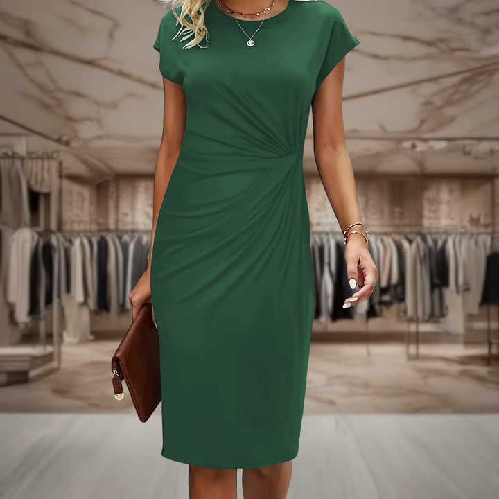 Stylish black women's adjustable wrap dress, flattering V-neck & short sleeves. Comfortable everyday & casual wear.