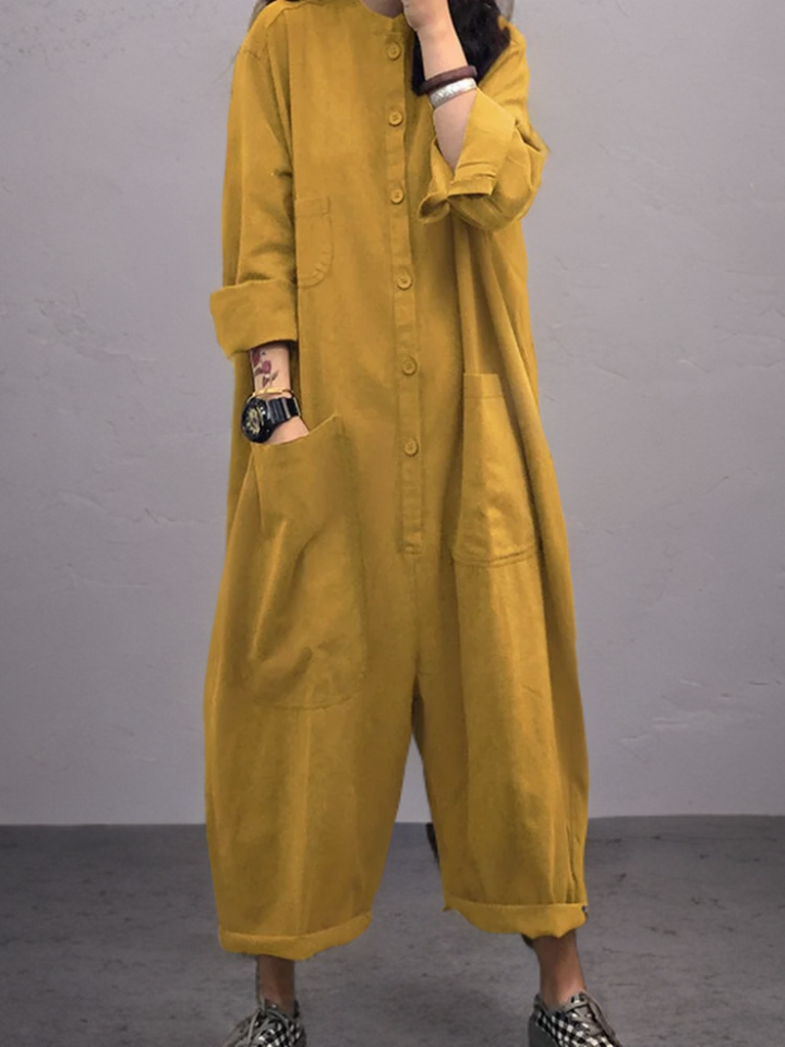 Women's airy wide-leg summer jumpsuit with V-neck. Comfortable casual outfit, perfect for vacation style.