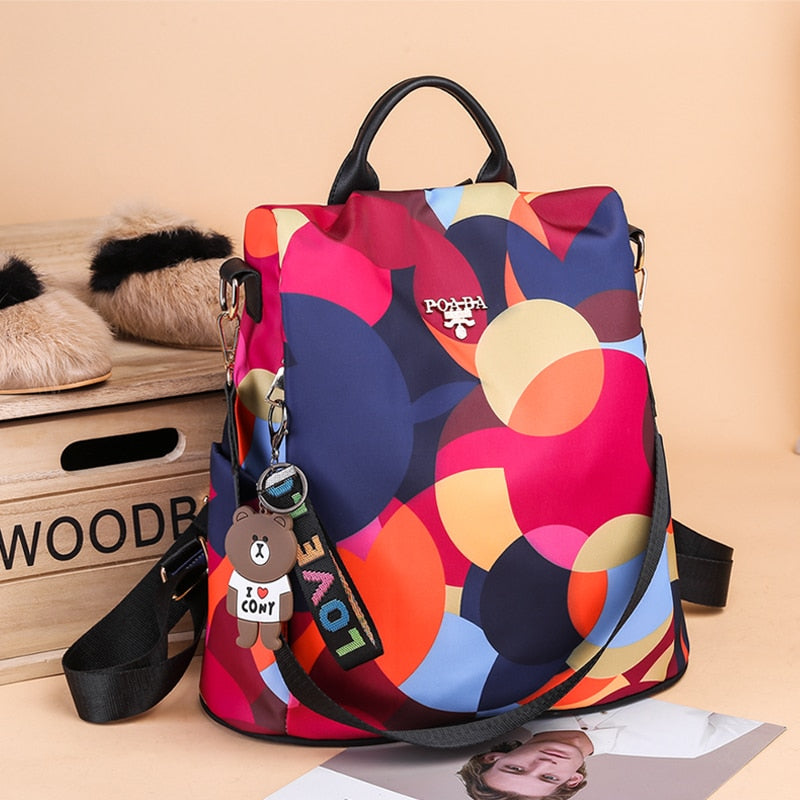 SafeHold women's travel backpack interior, showing secure compartments & dedicated pockets for organization.