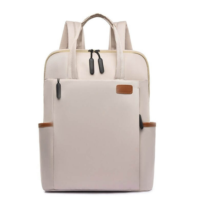 Women's anti-theft water-resistant travel backpack. Lightweight Oxford design for secure travel & daily use.